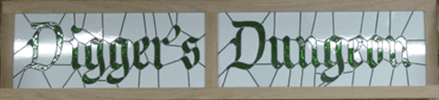Digger's Dungeon in green on opaque white glass, lighted sign trimmed in oak